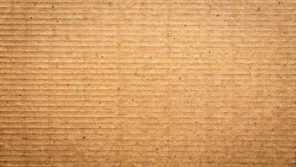cardboard texture rustic backdrop showcasing the natural beauty of brown paper, with its distinctive corrugations and warm, earthy color.