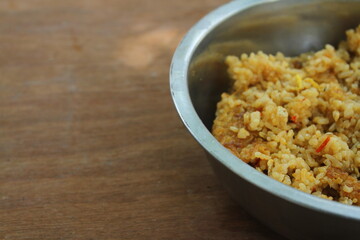 Fried rice in a bowl on the table with negative space