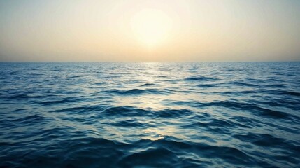 Obraz premium Serene Sunset Over Calm Ocean Waves