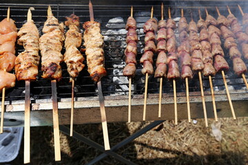 meat is fried on hot coals in a grill