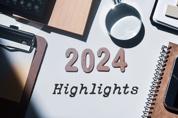 Highlights of the year 2024 concept with wooden letters and inscription. Best of the year, top...