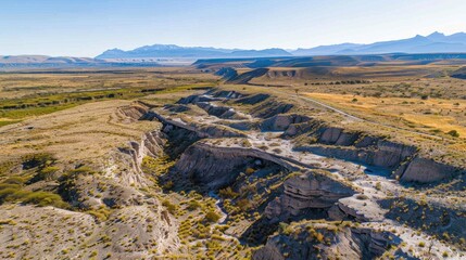 Aerial view of Patagonia desert revealing dinosaur fossils and ancient landscapes showcasing prehistoric life