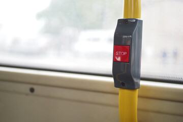 Closeup of Bus bell switch for stop inside the public bus