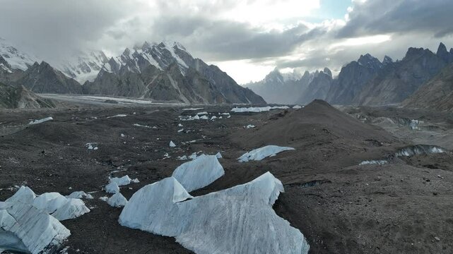 Large pieces of ice lining the Boltoro Glacier on the K2 Base Camp Trek in Pakistan near Goro 2 Campsite.