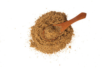 Coriander powder in wooden spoon isolated on white background. Food ingredients