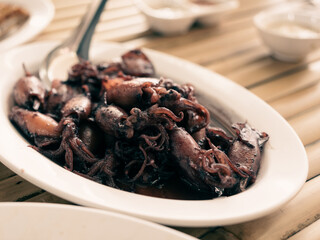 Squid black or Sauteed black squid is processed squid that is cooked until the squid ink is released. The resulting taste is very distinctive. Processed squid. Thai seafood style.