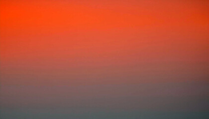 Sunset's fiery embrace: a breathtaking gradient of orange, red, and gray hues painting the twilight sky. A masterpiece of nature's artistry!