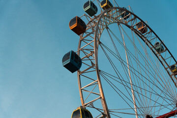 ferris wheel against blue sky