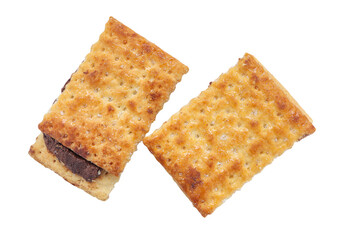 Dry thin chocolate crispy crackers or crispy cookies with chocolate filling on white background with clipping path. sandwich cookies filled with chocolate cream