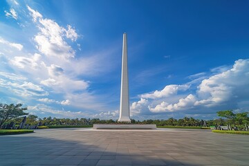 Fototapeta premium A photo of the very tall white Monas, the National Monument in Tanah Abang aircraft graveyard