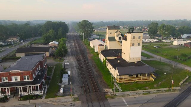 erial view of grain elevators and railroad tracks in Carleton, Michigan, USA
