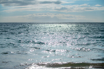Fototapeta premium Tropical blue ocean in Hawaii. Summer sea in clean and clear water from surface for background. Waves concept design.
