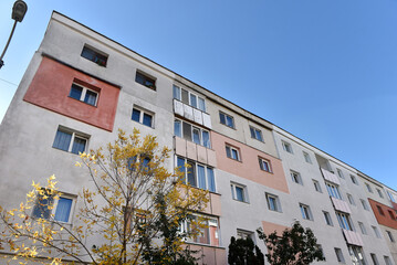 Typical facade of concrete panel building. Post Soviet flat of blocks