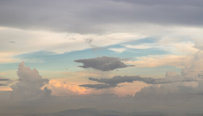 Obraz premium Dramatic clouds with blue sky background before sunset. The softness of the clouds and the brightness of the sky. Concept idea of Imaginative clouds and sky, Nature abstract composition,Space for text