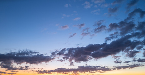 Clouds background. Dramatic Clouds Sunset Background. Sky with clouds in Sunrise. Sunrise with clouds in various shapes background. Calm Cloud.