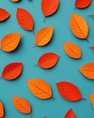 Obraz premium Vibrant autumn leaves scattered on teal background
