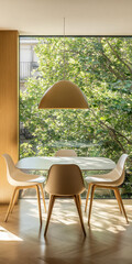 Obraz premium Modern dining space with a view of greenery in a bright, contemporary home