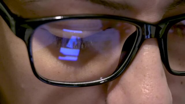 Watching Social Media on Smartphone, Phone Screen Reclection on Woman Glasses, Face Close up Shot