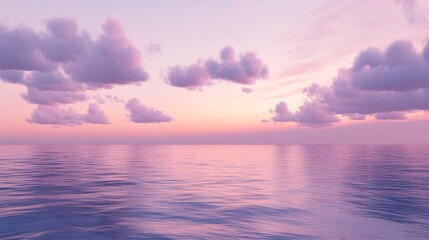 Obraz premium 2408 8.A tranquil dusk sky with pastel pink and purple hues blending harmoniously as the sun dips below the horizon. The evening clouds reflect the soft sunlight, creating a serene and peaceful