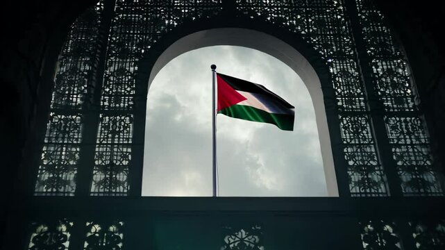 The camera zooms in toward a Palestinian flag framed by an intricate window design, illuminated by soft ambient lighting in a symbolic nighttime scene