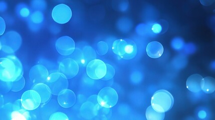 Fototapeta premium Blue Bokeh Background with Soft Light Effects