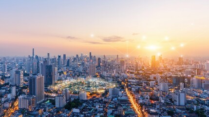 Obraz premium Breathtaking city skyline during sunset, showcasing skyscrapers and vibrant lights creating a stunning urban landscape.