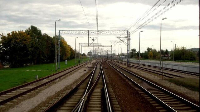 A close-up of the tracks captured while the train is in motion creates a dynamic sense of speed and travel. This shot conveys the energy of the journey and opens up new horizons.