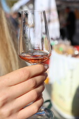 An Elegant Glass pouring over a Colorful Background, Capturing a Moment of Celebration