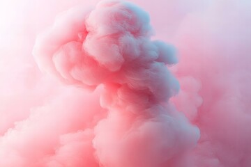 Fototapeta premium Beautiful Wispy Pink Smoke Cloud Forming Against a Clear Blue Sky Background
