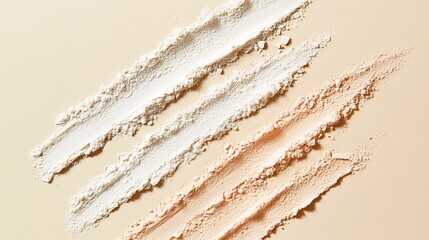 Three parallel stripes of delicate texture of decorative face powder in a natural tone on a beige background. View from above. Swatch powder. -