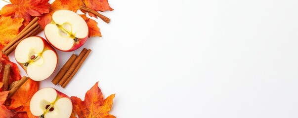 Floating apple slices and cinnamon sticks against a blank background for your creative text or design needs.