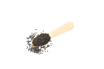 Basil seeds in a wooden spoon isolated on white background. Close-up. Superfood. Ocimum basilicum. Organic basil seeds.