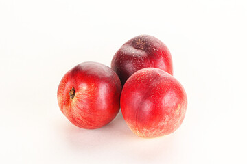 Ripe sweet juicy nectarines heap