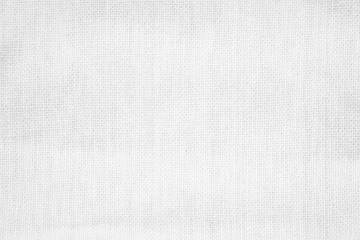 White textures of canvas, fabric, and paper showcasing a seamless design in natural shades of gray, ideal for a vintage backdrop or textile pattern.