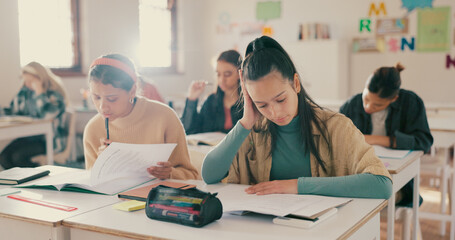 Education, reading or people in high school for test, assignment or knowledge development in assessment. Students, thinking or exam in classroom for English, understanding question or problem solving