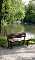 Fototapeta premium 41. An empty wooden bench by a calm river