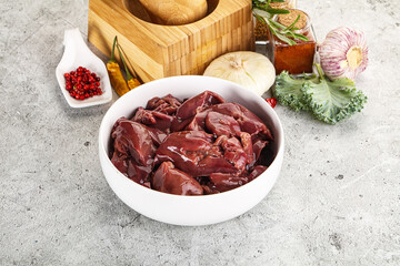Raw uncooked chicken liver in the bowl
