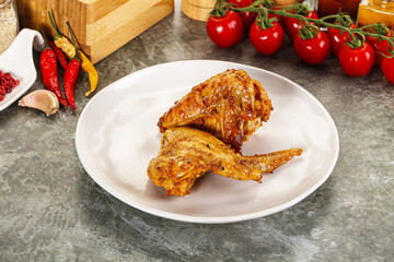 Tasty roasted chicken wing with spices