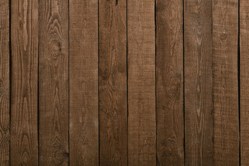 Naklejka premium natural wood background or texture of dark boards