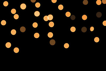 Soft glowing lights create warm and inviting atmosphere against dark background, perfect for festive occasions or cozy settings