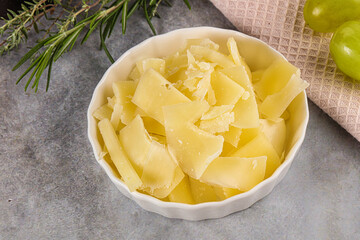 Parmesan cheese slices in the bowl