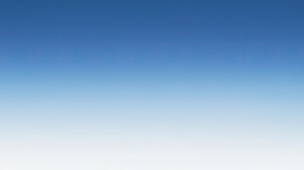 A Clear Blue Sky with a Gradual Fade to White at the Horizon