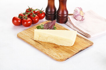 Piece Italian hard parmesan cheese