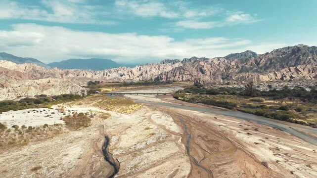 Aerial view of the bridge over Route 40 and the Cachalqui River in the Quebrada de las Flechas, Salta province, Argentina.