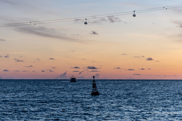 Fototapeta premium Sunset in the floating fishing village. An Thoi Port, Tropical Phu Quoc Island, Vietnam