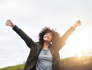 Happy woman, freedom and relax with sunshine in nature for holiday, weekend or outdoor vacation. Young, female person or gen z with smile for carefree summer, fun adventure or travel in countryside