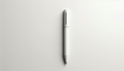 A white pen with a silver clip lies diagonally on a white background...Concept: Writing, stationery, mockup, elegant simplicity.