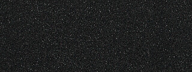 Obraz premium A close-up view of fine black sand, showcasing texture and color.