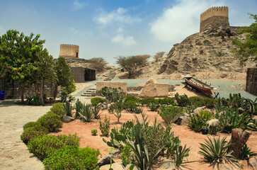 Exploring the historic Fujairah Fort and its scenic surroundings in Fujairah UAE on a sunny day