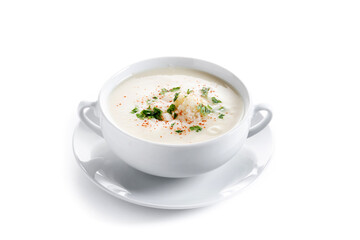 Cauliflower soup isolated on white background